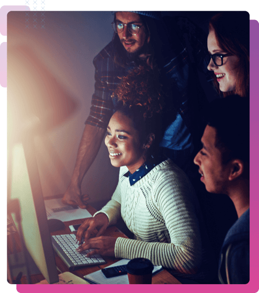 Group of friends looking at computer